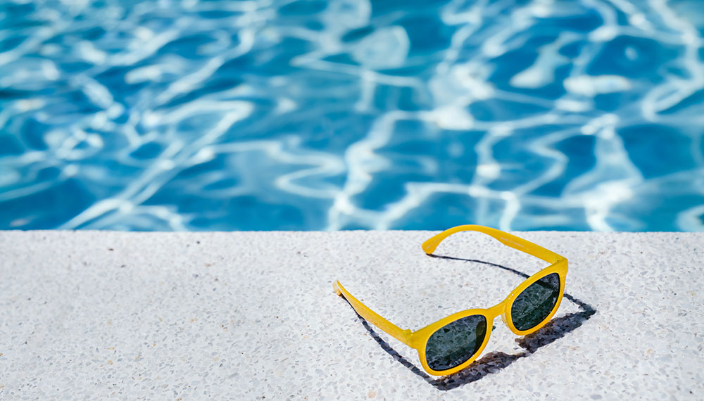 Sunglasses by the pool