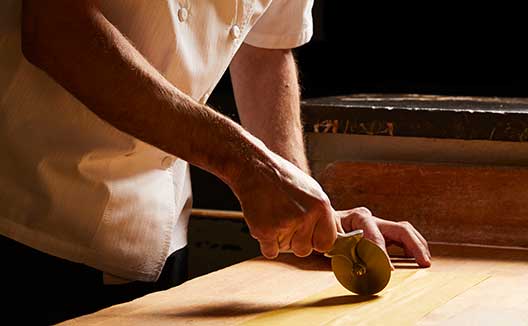 Chef making fresh pasta